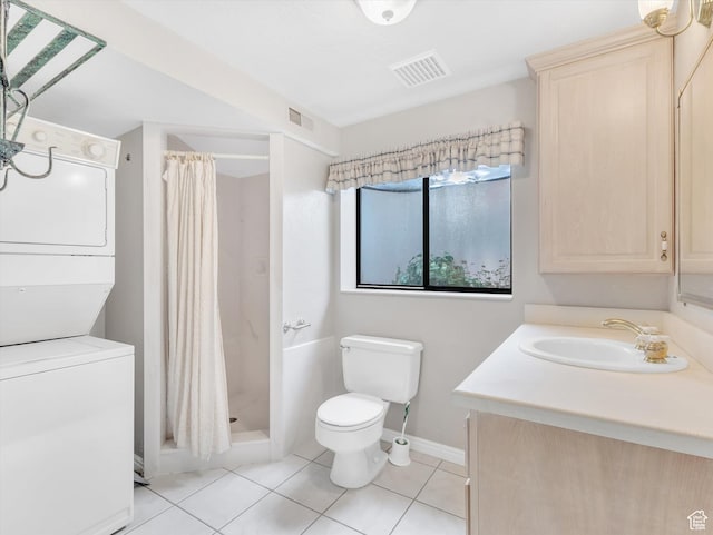 full bathroom with stacked washing machine and dryer, toilet, tile patterned flooring, and a shower stall
