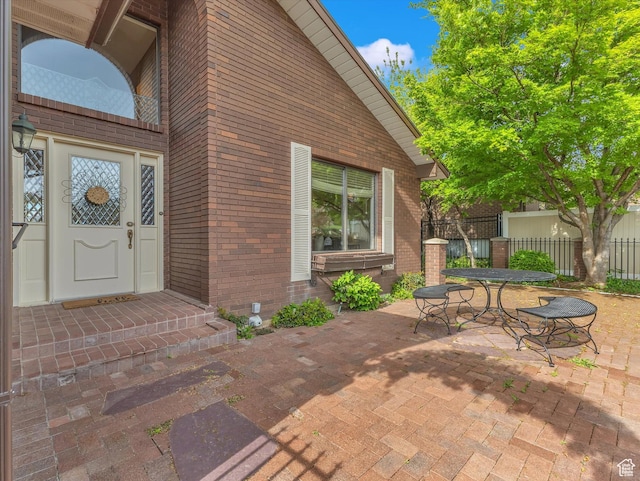view of patio / terrace featuring fence