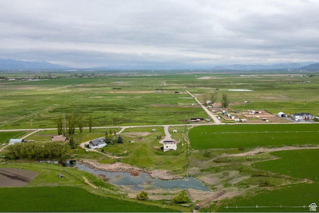 aerial overview of property's location featuring rural landscape and mountains