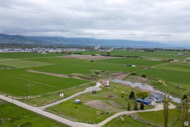 aerial view of property's location with rural landscape and mountains