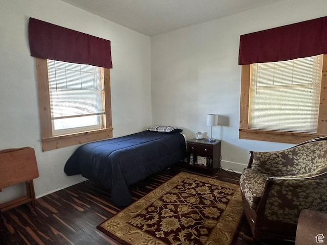 bedroom with wood finished floors