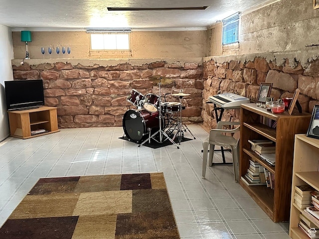 below grade area with tile patterned floors