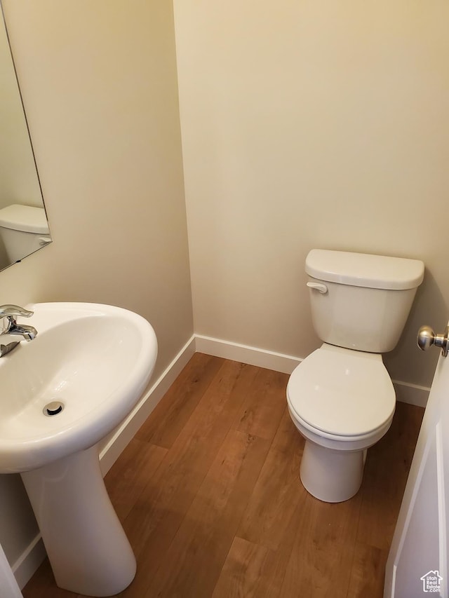 1186 N 1525 E Unit Arsf99, Payson, UT 84651 - half bathroom featuring baseboards, toilet, and wood finished floors
