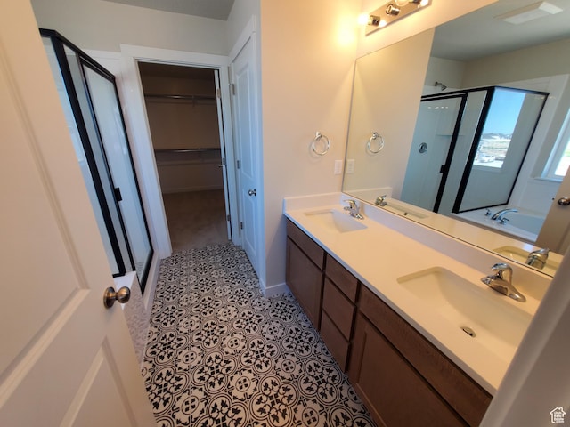 1186 N 1525 E Unit Arsf99, Payson, UT 84651 - bathroom featuring a stall shower, double vanity, a spacious closet, and a tub to relax in
