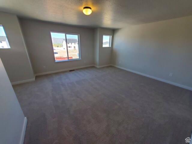 1186 N 1525 E Unit Arsf99, Payson, UT 84651 - spare room with baseboards, a textured ceiling, and carpet floors