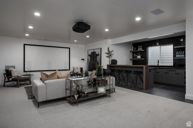cinema featuring recessed lighting and bar