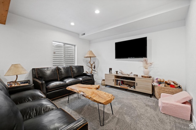 living area with carpet floors and recessed lighting