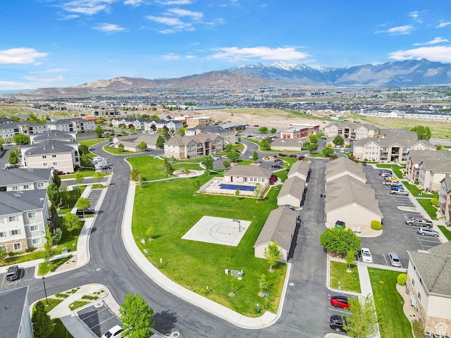 aerial view of residential area with a mountain backdrop