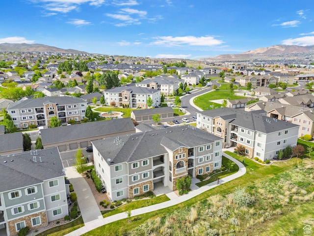 aerial view of residential area with mountains