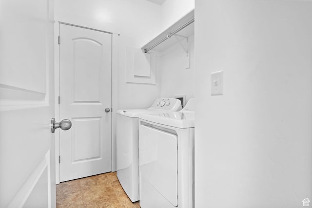 laundry room featuring independent washer and dryer