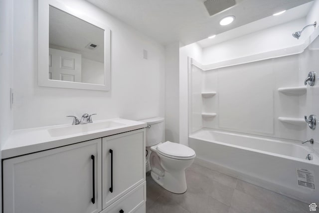 full bathroom with tile patterned flooring, toilet, vanity, and shower / bathtub combination