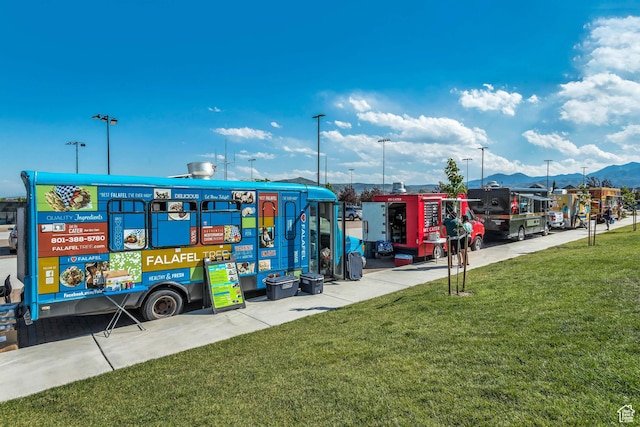 5153 W Bowstring Way S, Jordan, UT 84009 - view of community with a mountain view and a lawn
