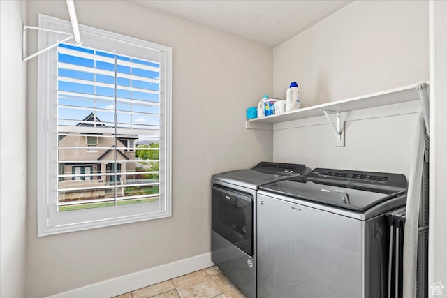 5153 W Bowstring Way S, Jordan, UT 84009 - laundry room featuring washing machine and clothes dryer, baseboards, and a textured ceiling