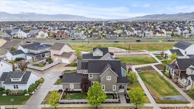 5153 W Bowstring Way S, Jordan, UT 84009 - aerial perspective of suburban area featuring a mountain backdrop