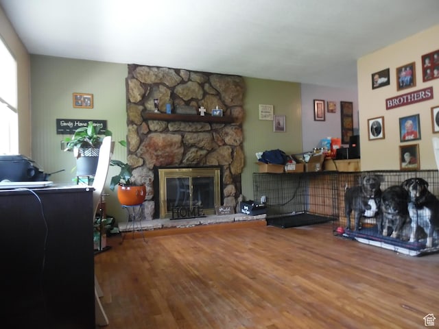 477 W Grand Cir, Moab, UT 84532 - living room with wood finished floors and a stone fireplace