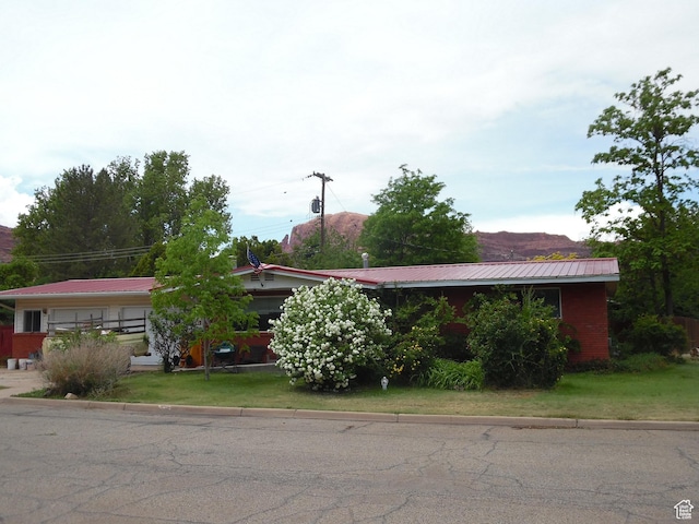 477 W Grand Cir, Moab, UT 84532 - view of front of house with metal roof