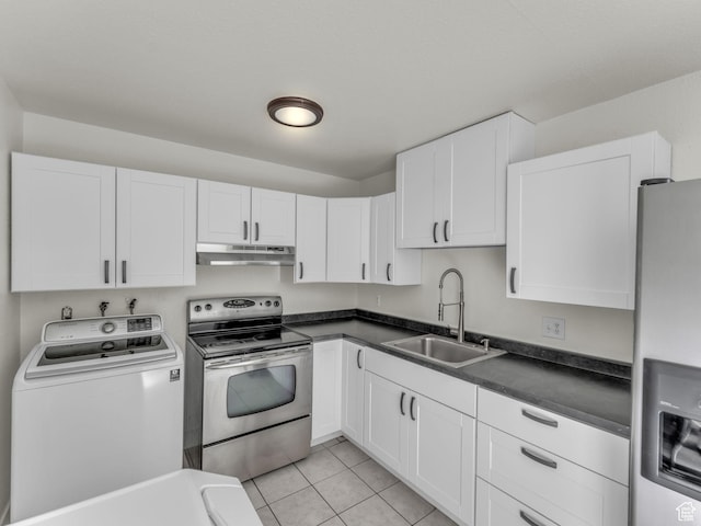 kitchen featuring washer / dryer, stainless steel appliances, under cabinet range hood, a sink, and white cabinets