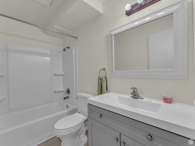full bath with toilet, vanity, and shower / washtub combination