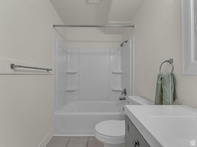 full bath with toilet, tile patterned floors, vanity, tub / shower combination, and baseboards