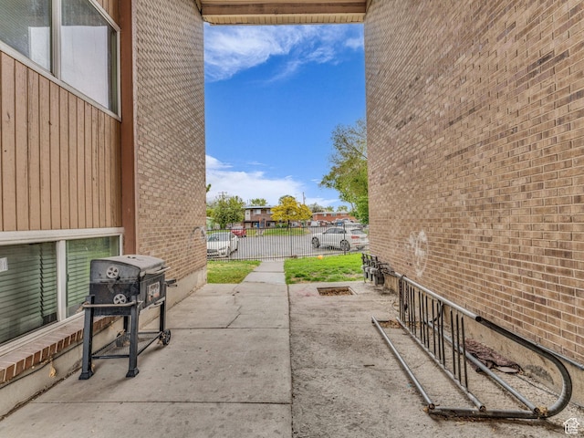 view of patio / terrace featuring fence and area for grilling