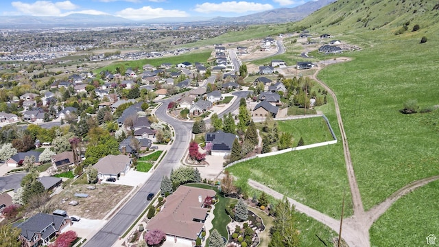 90 S Sherwood Dr, Providence, UT 84332 - aerial view of property and surrounding area with mountains and nearby suburban area