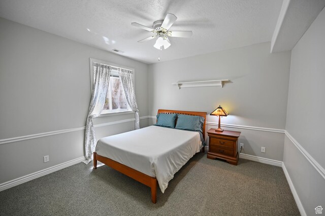 90 S Sherwood Dr, Providence, UT 84332 - bedroom featuring a textured ceiling, carpet, ceiling fan, and baseboards