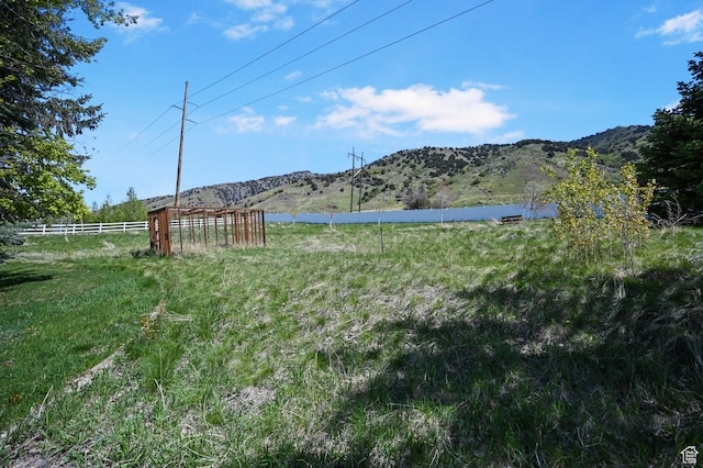 90 S Sherwood Dr, Providence, UT 84332 - view of yard with fence, a mountain view, and a view of rural / pastoral area