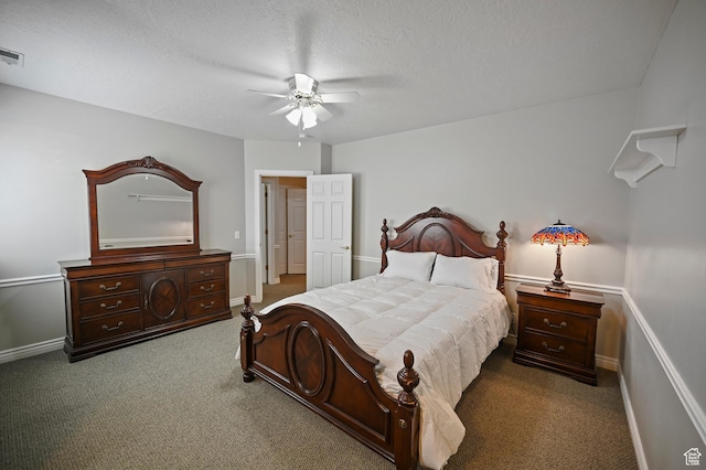 90 S Sherwood Dr, Providence, UT 84332 - carpeted bedroom featuring ceiling fan, baseboards, and a textured ceiling