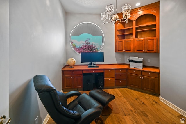 90 S Sherwood Dr, Providence, UT 84332 - office area with a chandelier, light wood-style floors, and baseboards