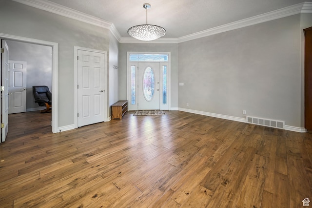 90 S Sherwood Dr, Providence, UT 84332 - entryway with crown molding, hardwood / wood-style flooring, baseboards, and a chandelier
