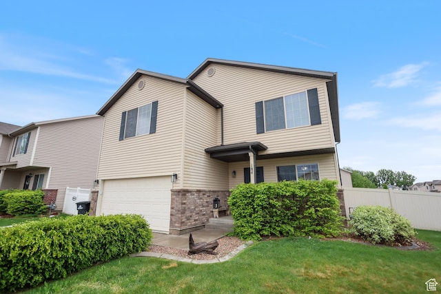 view of front of home featuring a garage and brick siding