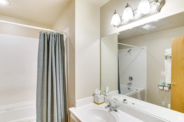 40 N Christa Cir, Garden City, UT 84028 - full bath featuring shower / bath combo and vanity