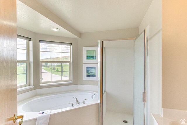 40 N Christa Cir, Garden City, UT 84028 - bathroom featuring a shower stall and a bath