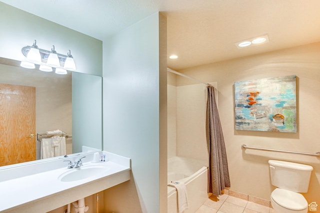 40 N Christa Cir, Garden City, UT 84028 - full bath with tile patterned floors, toilet, shower / bath combo, a sink, and baseboards
