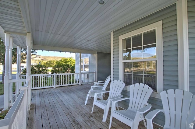 40 N Christa Cir, Garden City, UT 84028 - wooden deck featuring a porch