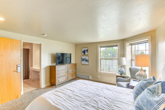 40 N Christa Cir, Garden City, UT 84028 - bedroom featuring a baseboard radiator, a textured ceiling, ensuite bath, baseboards, and light tile patterned floors