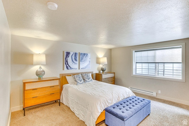 40 N Christa Cir, Garden City, UT 84028 - bedroom with a baseboard radiator, a textured ceiling, carpet flooring, and baseboards