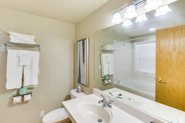 40 N Christa Cir, Garden City, UT 84028 - bathroom with a sink, shower / tub combination, toilet, and a chandelier