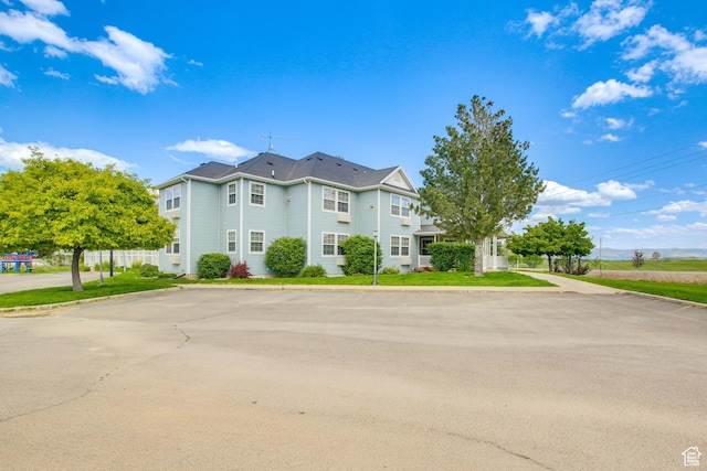 40 N Christa Cir, Garden City, UT 84028 - view of front of home with uncovered parking and fence