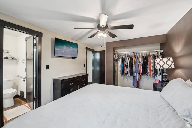 bedroom featuring a closet, a ceiling fan, and ensuite bathroom