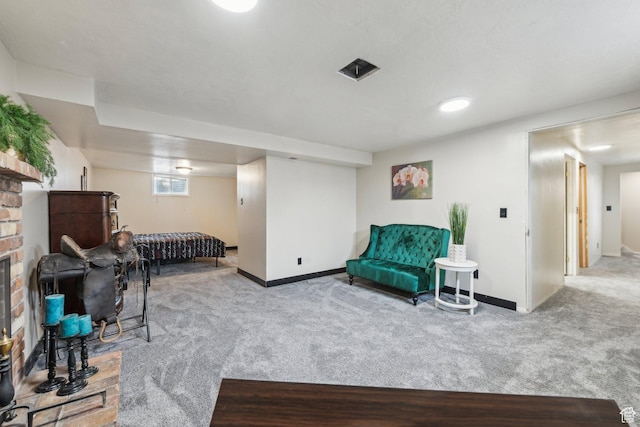 sitting room featuring carpet flooring and baseboards