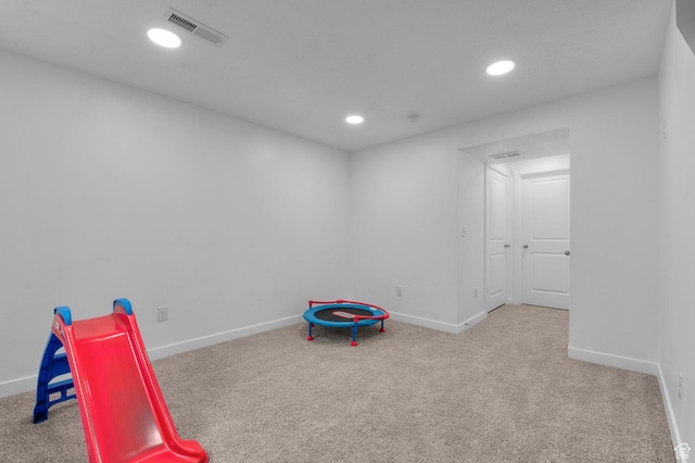 playroom with carpet, recessed lighting, and baseboards