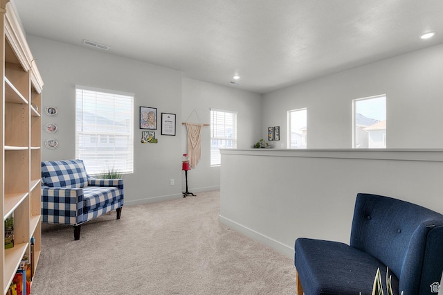 2546 N Wister Ln Unit 334, Lehi, UT 84043 - living area with light colored carpet, baseboards, and recessed lighting