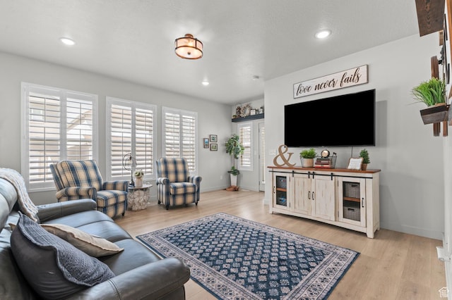 2546 N Wister Ln Unit 334, Lehi, UT 84043 - living room featuring wood finished floors, baseboards, and recessed lighting