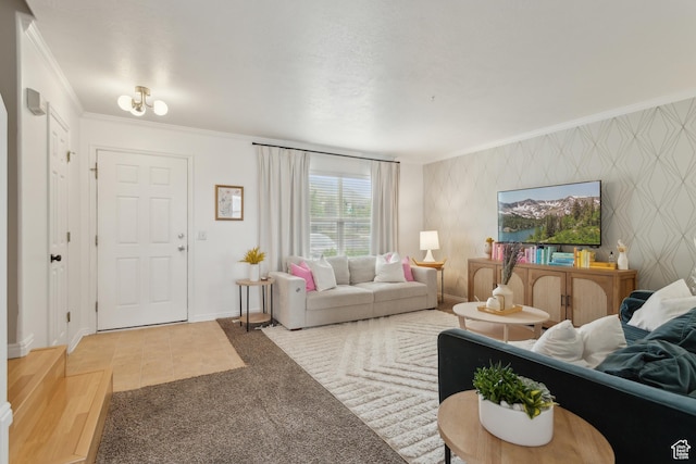 living room with ornamental molding, carpet, baseboards, and wallpapered walls