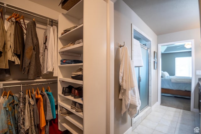 spacious closet featuring a ceiling fan