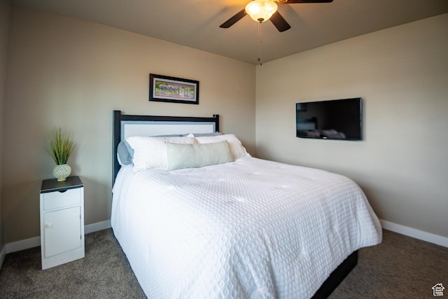 bedroom with carpet flooring, baseboards, and a ceiling fan
