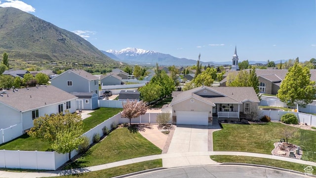 aerial perspective of suburban area featuring a mountain backdrop