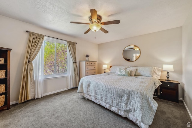 bedroom featuring carpet flooring, baseboards, and ceiling fan