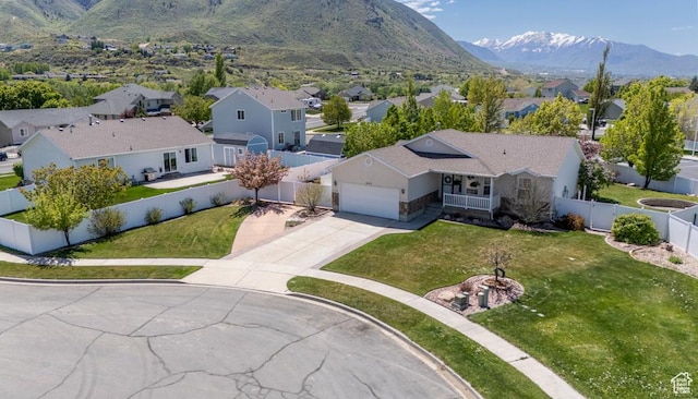 aerial perspective of suburban area featuring a mountain backdrop